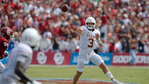 Texas Longhorns quarterback Quinn Ewers (3) throws a pass during the Red River Showdown college football game between the University of Oklahoma (OU) and Texas at the Cotton Bowl in Dallas, Saturday, Oct. 8, 2022. Texas won 49-0. Lx17927